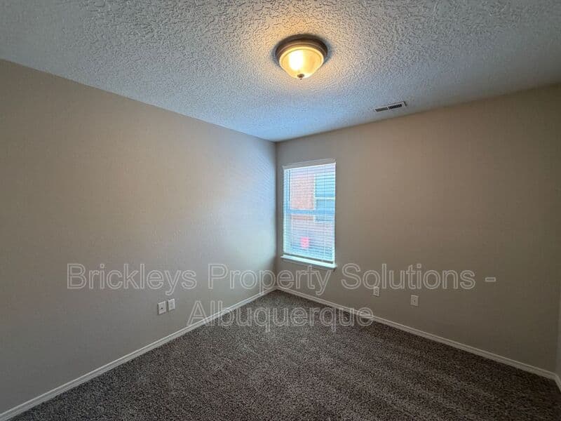 3-bedroom 2-bath home at 8035 Sierra Altos Pl. NW for $2,150/mo managed by Brickleys Property Solutions Albuquerque — photo 21 of 29