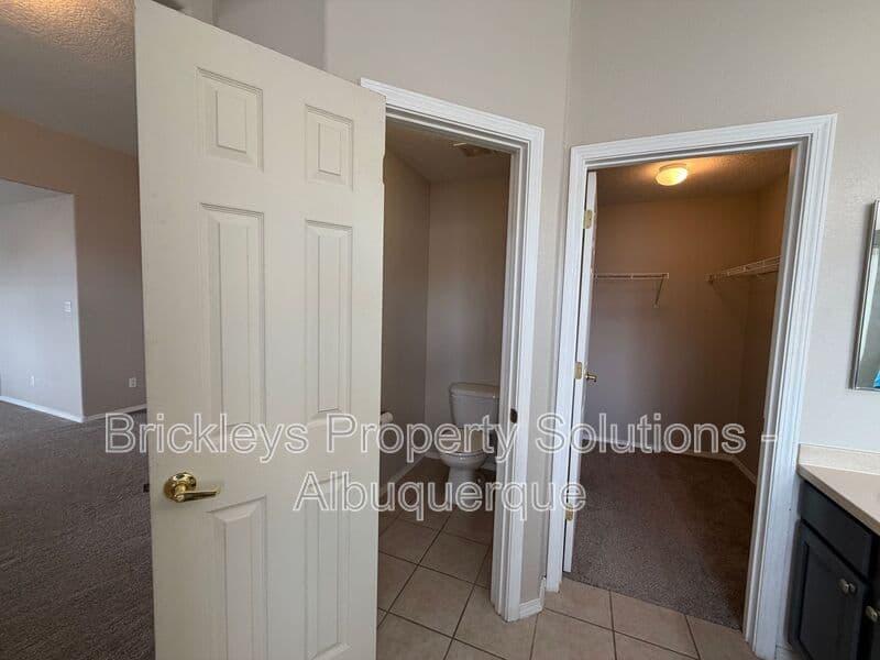 5-bedroom 4.5-bath home at 7008 Tree Line Ave NW for $2,500/mo managed by Brickleys Property Solutions Albuquerque — photo 12 of 43
