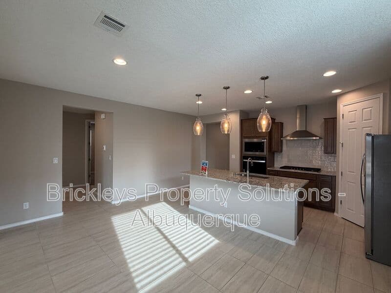 3-bedroom 2-bath home at 938 Lazuli Rd SE for $2,475/mo managed by Brickleys Property Solutions Albuquerque — photo 14 of 36