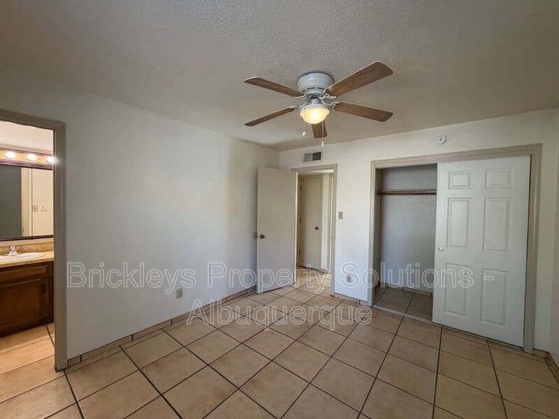 3-bedroom 2-bath home at 9937 Clearwater St. NW for $1,900/mo managed by Brickleys Property Solutions Albuquerque — photo 11 of 27