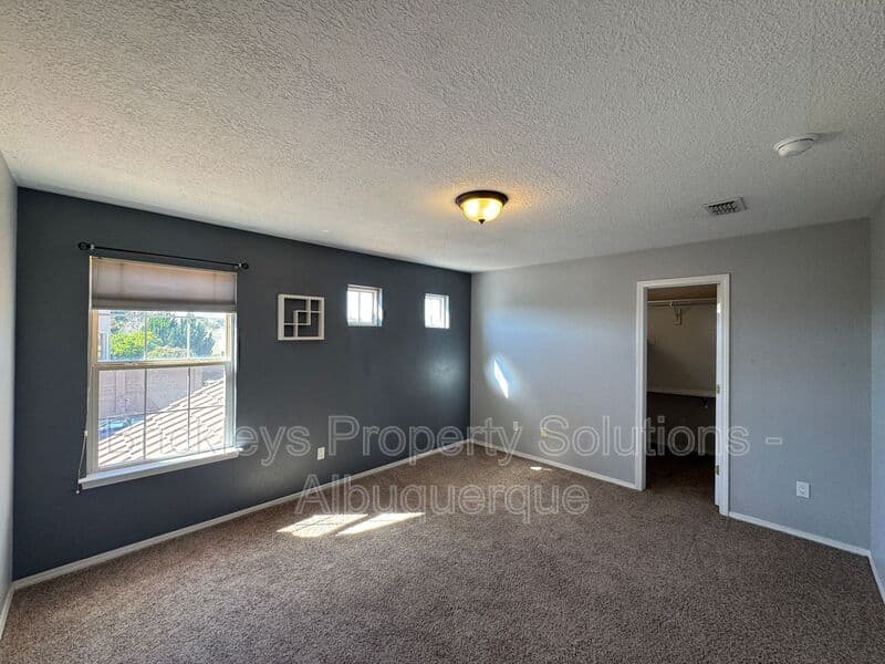 4-bedroom 3-bath home at 7131 Wild Olive Ave NE for $2,900/mo managed by Brickleys Property Solutions Albuquerque — photo 20 of 38