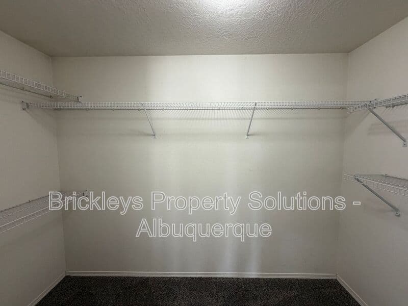 3-bedroom 2-bath home at 10601 Rio Del Sole Ct NW for $2,000/mo managed by Brickleys Property Solutions Albuquerque — photo 15 of 29