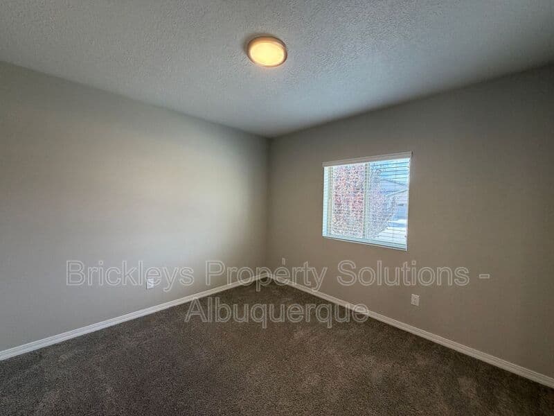 4-bedroom 2-bath home at 3969 Kodiak Rd NE for $2,700/mo managed by Brickleys Property Solutions Albuquerque — photo 6 of 40
