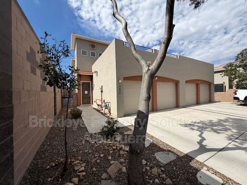 4-bedroom 2.5-bath home at 7420 Tangerine Court NE for $2,450/mo managed by Brickleys Property Solutions Albuquerque — photo 2 of 39