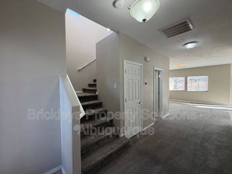 5-bedroom 4.5-bath home at 7008 Tree Line Ave NW for $2,500/mo managed by Brickleys Property Solutions Albuquerque — photo 5 of 43