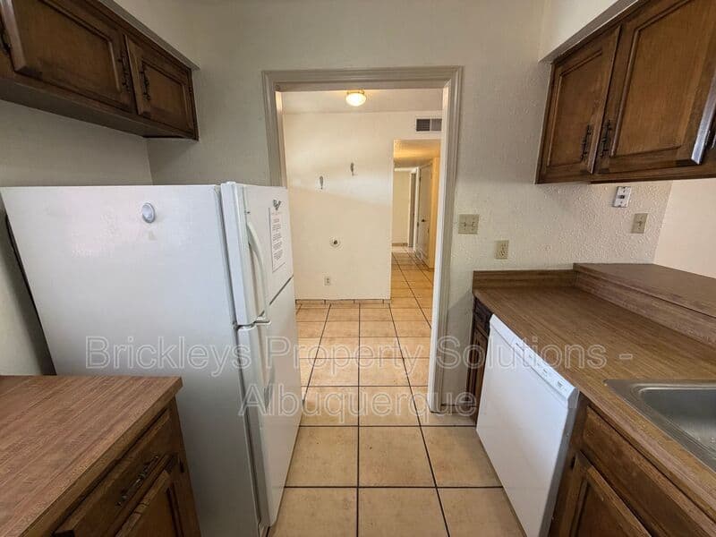 3-bedroom 2-bath home at 9937 Clearwater St. NW for $1,900/mo managed by Brickleys Property Solutions Albuquerque — photo 19 of 27
