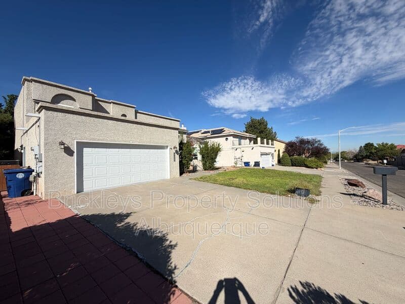 3-bedroom 2.5-bath home at 9600 Allande Rd NE for $3,200/mo managed by Brickleys Property Solutions Albuquerque — photo 3 of 40