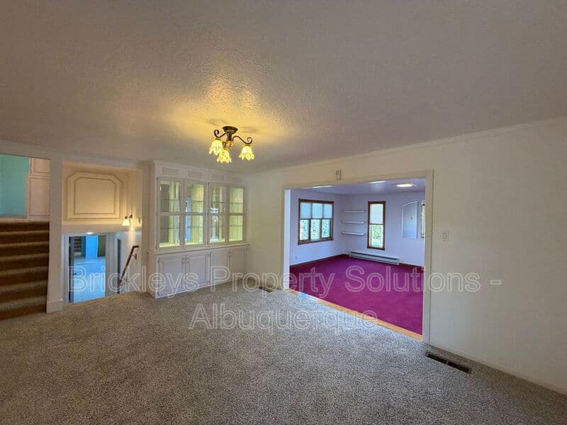 4-bedroom 3-bath home at 7121 Edwina Ave NE for $2,450/mo managed by Brickleys Property Solutions Albuquerque — photo 14 of 47