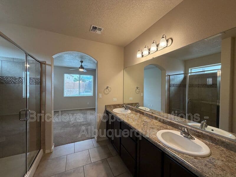 3-bedroom 2-bath home at 7304 Skagway Dr. NE for $2,200/mo managed by Brickleys Property Solutions Albuquerque — photo 24 of 36