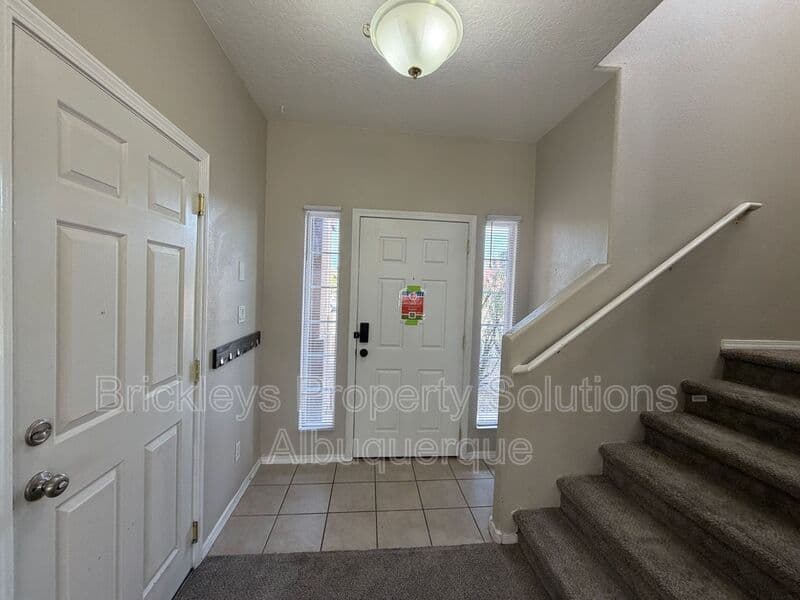 5-bedroom 4.5-bath home at 7008 Tree Line Ave NW for $2,500/mo managed by Brickleys Property Solutions Albuquerque — photo 4 of 43