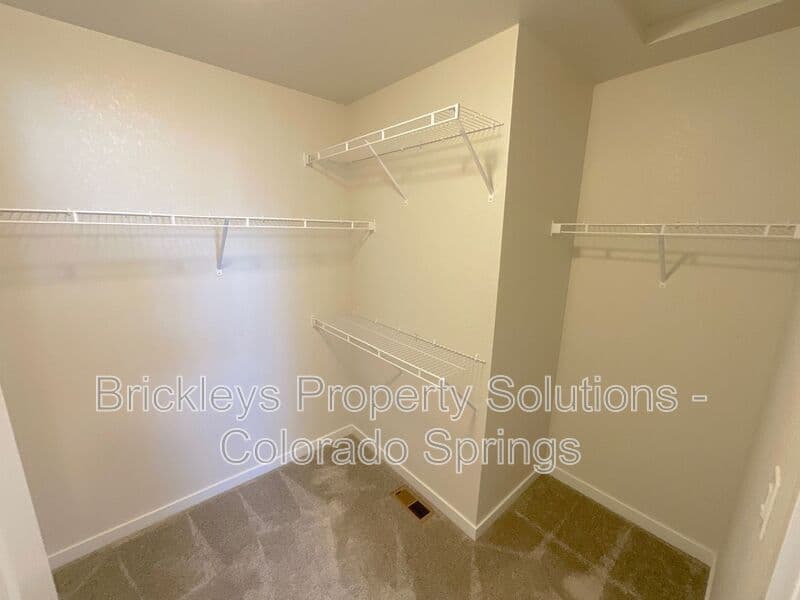 3-bedroom 3.5-bath home at 7343 Rosa Belle Hts for $2,350/mo managed by Brickleys Property Solutions Colorado Springs — photo 27 of 33