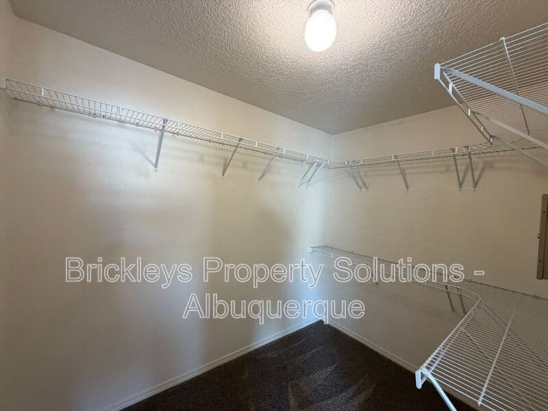 4-bedroom 3-bath home at 1904 Busher St. SE for $2,450/mo managed by Brickleys Property Solutions Albuquerque — photo 16 of 50