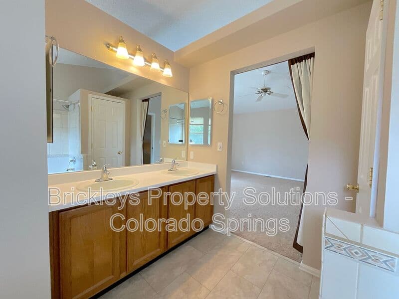 4-bedroom 3.5-bath home at 6160 Jaffee Ct for $2,500/mo managed by Brickleys Property Solutions Colorado Springs — photo 32 of 45