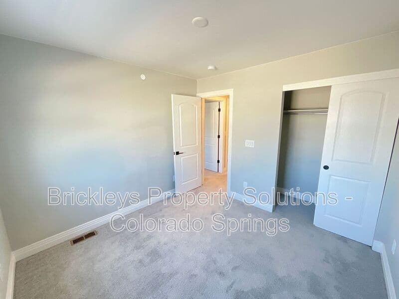 3-bedroom 2.5-bath home at 1721 Rose Quartz Hts for $2,300/mo managed by Brickleys Property Solutions Colorado Springs — photo 25 of 28