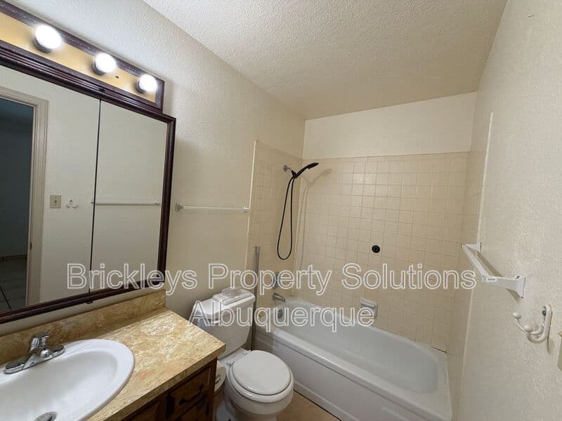 3-bedroom 2-bath home at 9937 Clearwater St. NW for $1,900/mo managed by Brickleys Property Solutions Albuquerque — photo 12 of 27