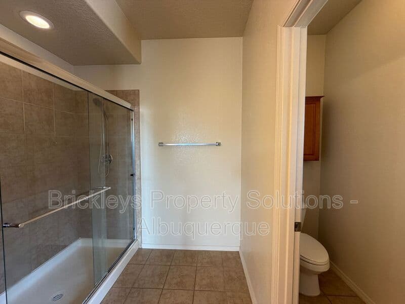 4-bedroom 3.5-bath home at 6228 Nacional Rd NW for $2,700/mo managed by Brickleys Property Solutions Albuquerque — photo 32 of 44