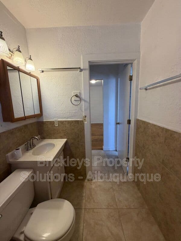 4-bedroom 2-bath home at 313 Cornell Drive SE Unit A for $1,600/mo managed by Brickleys Property Solutions Albuquerque — photo 14 of 27