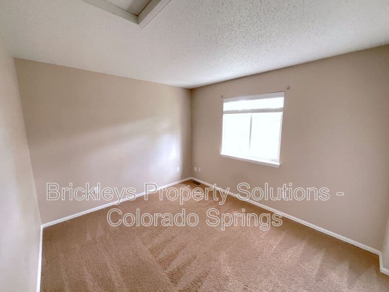 4-bedroom 3.5-bath home at 6160 Jaffee Ct for $2,500/mo managed by Brickleys Property Solutions Colorado Springs — photo 34 of 45