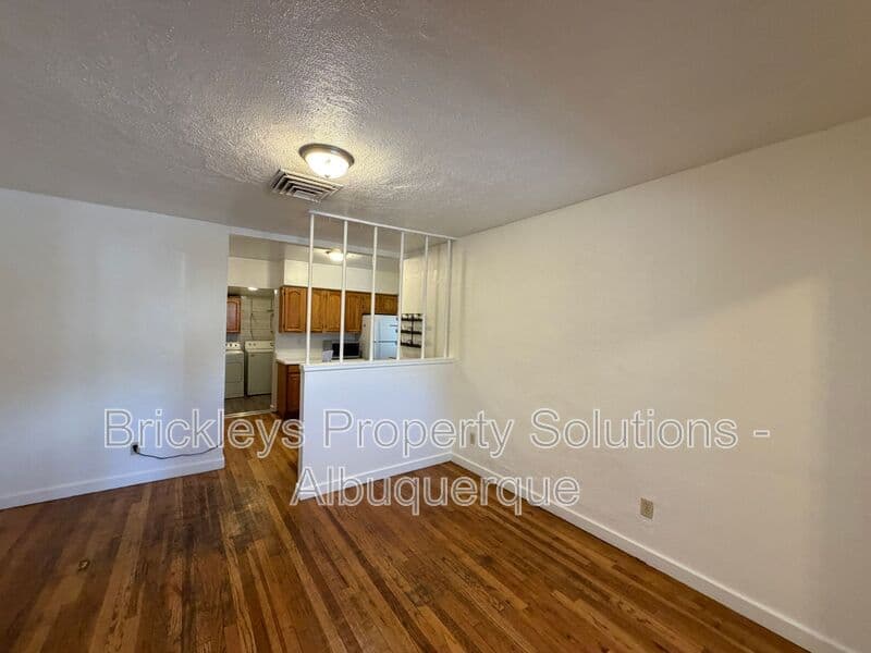 4-bedroom 2-bath home at 313 Cornell Drive SE Unit A for $1,600/mo managed by Brickleys Property Solutions Albuquerque — photo 8 of 27