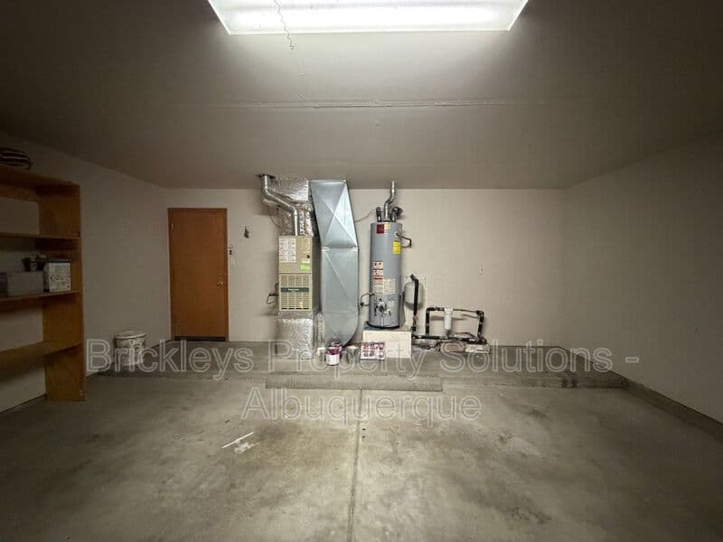 3-bedroom 2-bath home at 12606 Colony Pl NE for $2,250/mo managed by Brickleys Property Solutions Albuquerque — photo 28 of 32