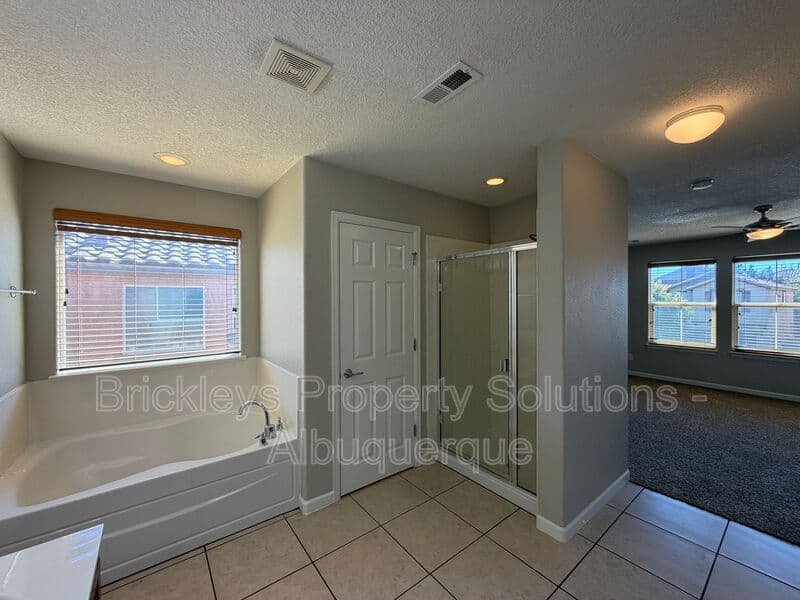 3-bedroom 2.5-bath home at 418 Paseo Roja Pl NE for $2,375/mo managed by Brickleys Property Solutions Albuquerque — photo 21 of 42