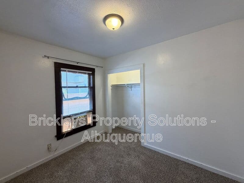 4-bedroom 2-bath home at 313 Cornell Drive SE Unit A for $1,600/mo managed by Brickleys Property Solutions Albuquerque — photo 15 of 27