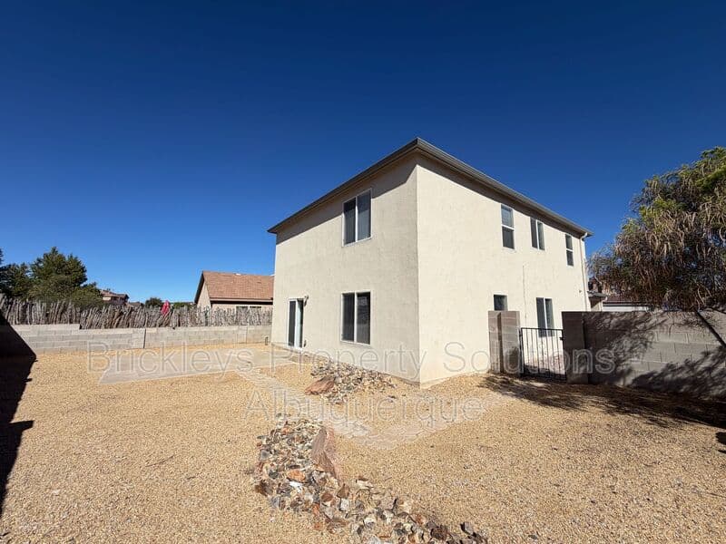 4-bedroom 3-bath home at 6027 Park South Pl NW for $2,400/mo managed by Brickleys Property Solutions Albuquerque — photo 5 of 36