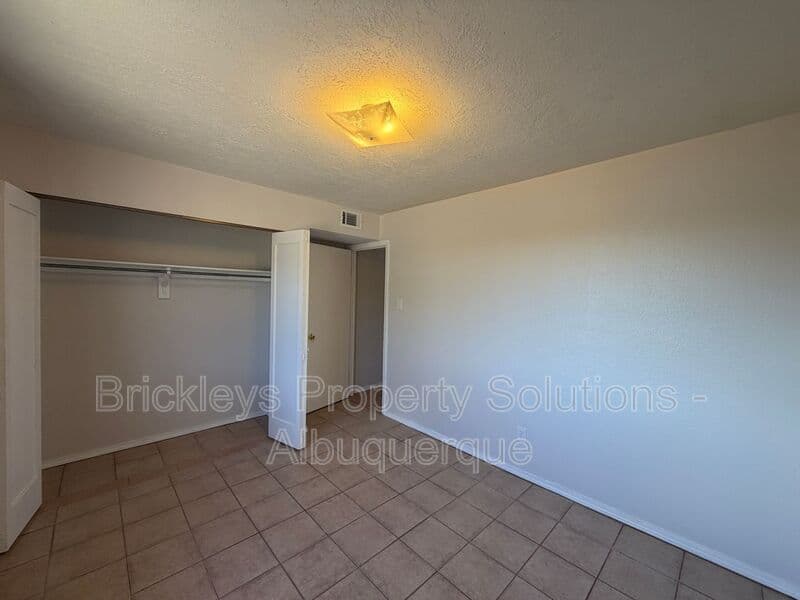 4-bedroom 2-bath home at 5812 Brahma Dr NW for $1,950/mo managed by Brickleys Property Solutions Albuquerque — photo 21 of 35