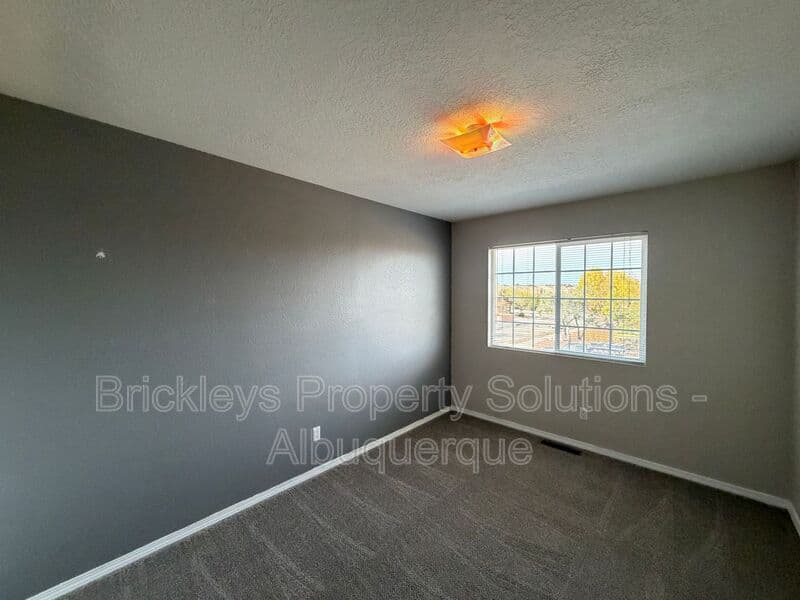 5-bedroom 4.5-bath home at 7008 Tree Line Ave NW for $2,500/mo managed by Brickleys Property Solutions Albuquerque — photo 18 of 43