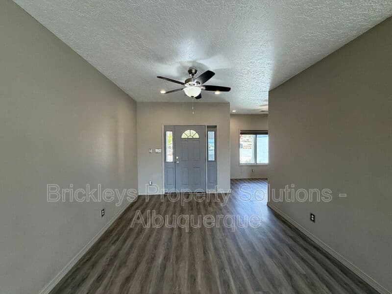 3-bedroom 2-bath home at 6812 Nagoya Rd NE for $2,700/mo managed by Brickleys Property Solutions Albuquerque — photo 5 of 43