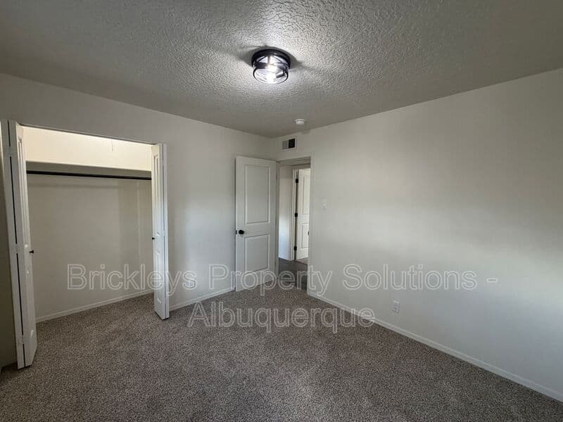 3-bedroom 2-bath home at 5608 Drake Ave NW for $2,100/mo managed by Brickleys Property Solutions Albuquerque — photo 14 of 32