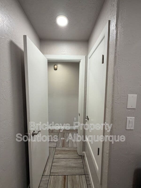 3-bedroom 2-bath home at 7024 Westford Pl NW for $2,200/mo managed by Brickleys Property Solutions Albuquerque — photo 24 of 33