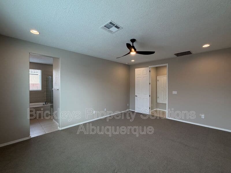3-bedroom 2-bath home at 938 Lazuli Rd SE for $2,475/mo managed by Brickleys Property Solutions Albuquerque — photo 18 of 36