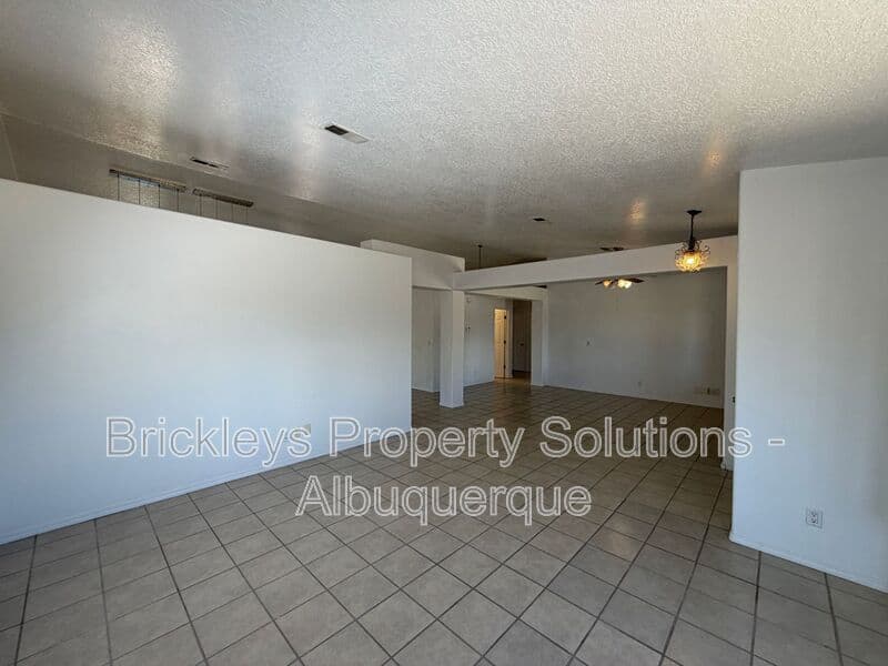 3-bedroom 2-bath home at 1405 Secret Valley Drive SW for $1,800/mo managed by Brickleys Property Solutions Albuquerque — photo 6 of 34