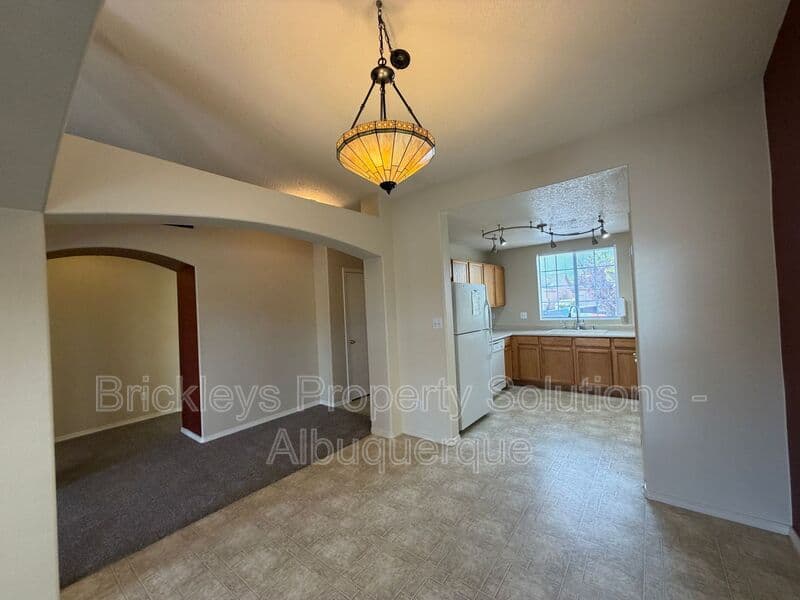 3-bedroom 2-bath home at 7704 Woodstar Ave NW for $1,825/mo managed by Brickleys Property Solutions Albuquerque — photo 8 of 28