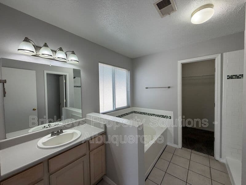3-bedroom 2-bath home at 10601 Rio Del Sole Ct NW for $2,000/mo managed by Brickleys Property Solutions Albuquerque — photo 14 of 29