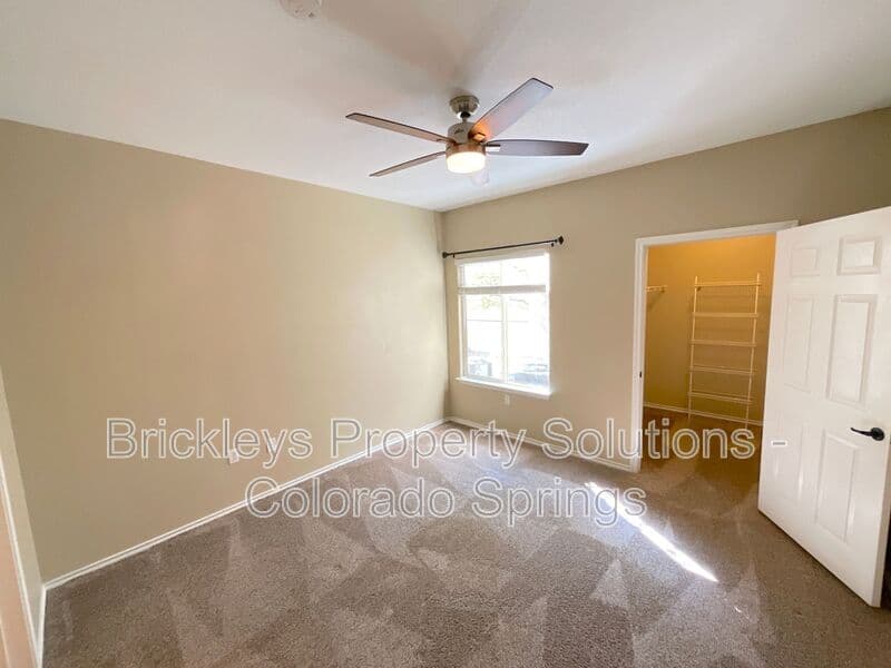 3-bedroom 2-bath home at 3780 Riviera Grove Unit #104 for $1,863/mo total (includes $1,825 base rent + $38 required Tenant Benefit Package) managed by Brickleys Property Solutions Colorado Springs — photo 11 of 24