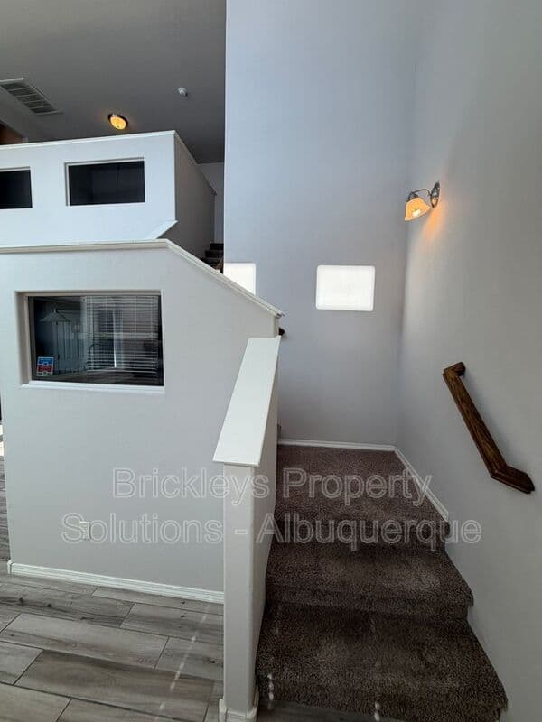 4-bedroom 2.5-bath home at 7420 Tangerine Court NE for $2,450/mo managed by Brickleys Property Solutions Albuquerque — photo 5 of 39