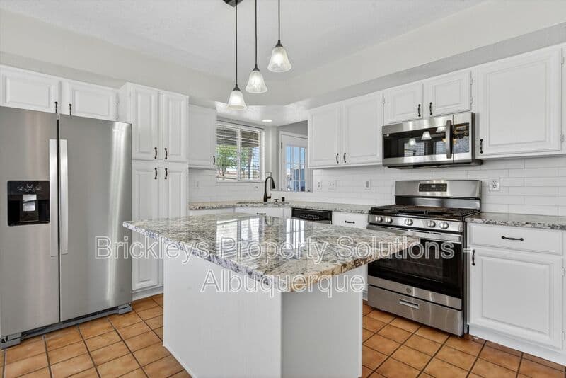 4-bedroom 2-bath home at 2413 Agua Fria Dr NE for $2,275/mo managed by Brickleys Property Solutions Albuquerque — photo 25 of 42