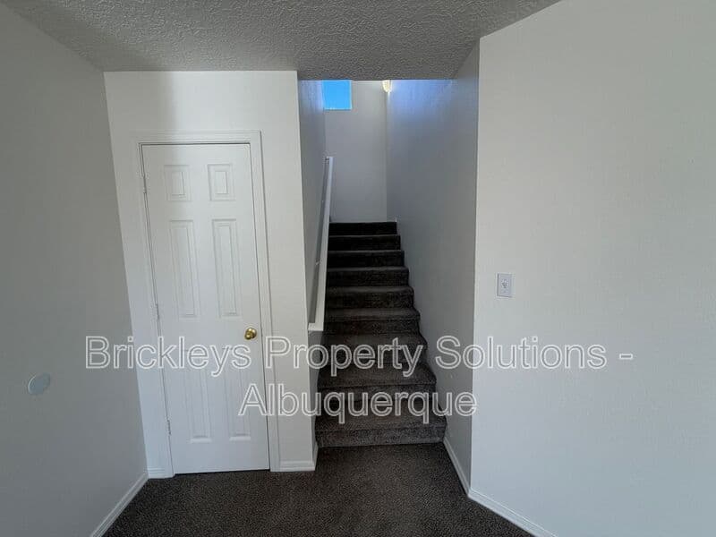 4-bedroom 3-bath home at 6027 Park South Pl NW for $2,400/mo managed by Brickleys Property Solutions Albuquerque — photo 16 of 36