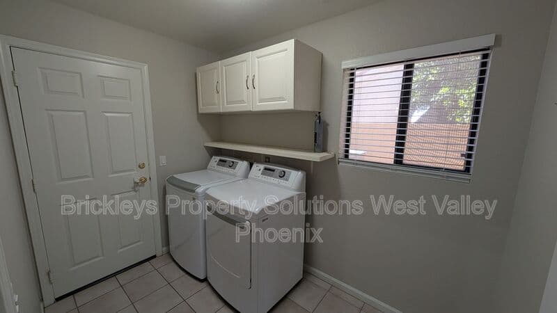 4-bedroom 3-bath home at 13354 W Palm Ln for $2,750/mo managed by Brickleys Property Solutions West Valley Phoenix — photo 22 of 31