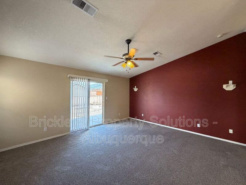 3-bedroom 2-bath home at 7704 Woodstar Ave NW for $1,825/mo managed by Brickleys Property Solutions Albuquerque — photo 9 of 28
