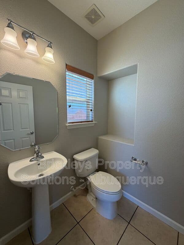 3-bedroom 2.5-bath home at 418 Paseo Roja Pl NE for $2,375/mo managed by Brickleys Property Solutions Albuquerque — photo 32 of 42