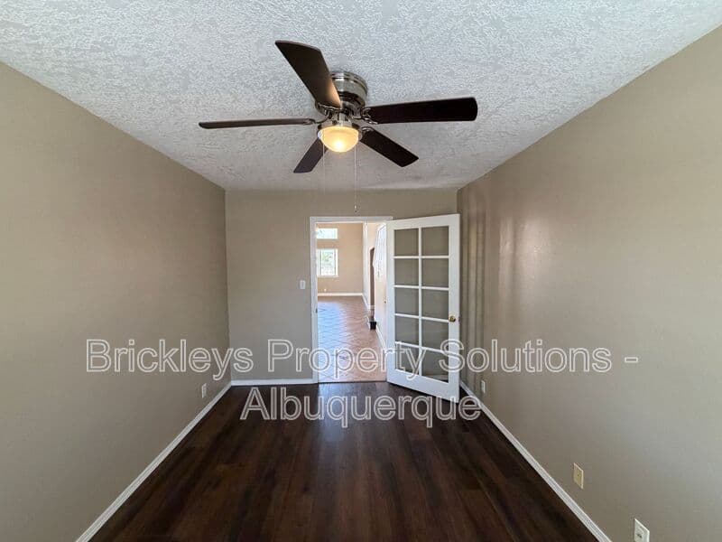 3-bedroom 2.5-bath home at 10527 Brookline Pl NW for $2,300/mo managed by Brickleys Property Solutions Albuquerque — photo 6 of 40