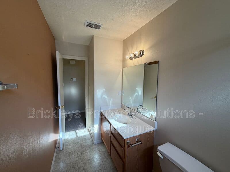 3-bedroom 2-bath home at 7704 Woodstar Ave NW for $1,825/mo managed by Brickleys Property Solutions Albuquerque — photo 18 of 28