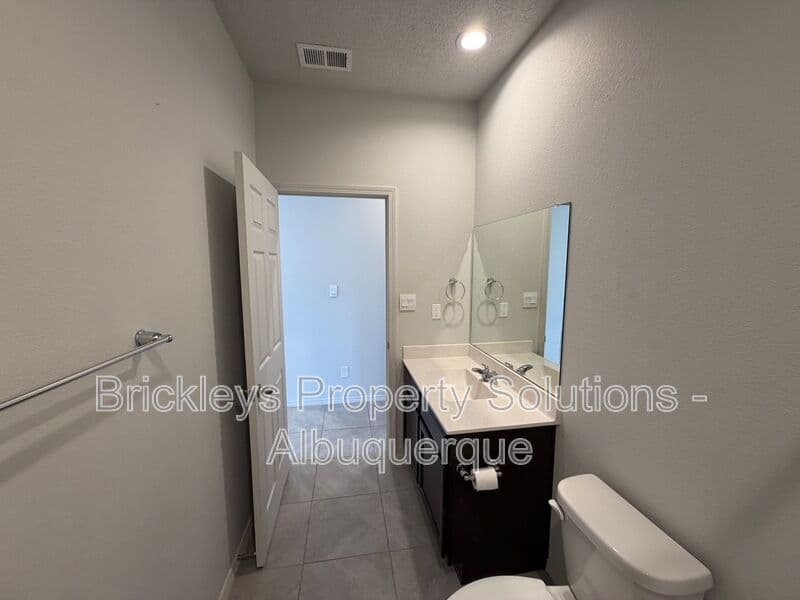 3-bedroom 2-bath home at 1504 Alto Colores for $2,100/mo managed by Brickleys Property Solutions Albuquerque — photo 20 of 30