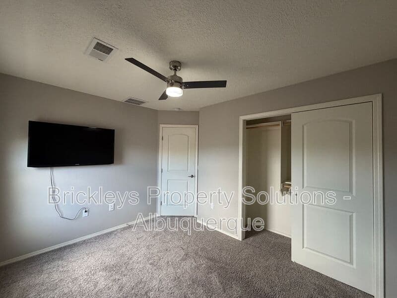 4-bedroom 3-bath home at 860 Fire Wheel Loop for $2,300/mo managed by Brickleys Property Solutions Albuquerque — photo 16 of 40