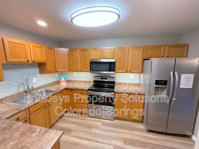 3-bedroom 2.5-bath home at 1742 Victorian Pt for $2,338/mo total (includes $2,300 base rent + $38 required Tenant Benefit Package) managed by Brickleys Property Solutions Colorado Springs — photo 12 of 36