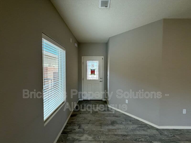 4-bedroom 3-bath home at 860 Fire Wheel Loop for $2,300/mo managed by Brickleys Property Solutions Albuquerque — photo 4 of 40