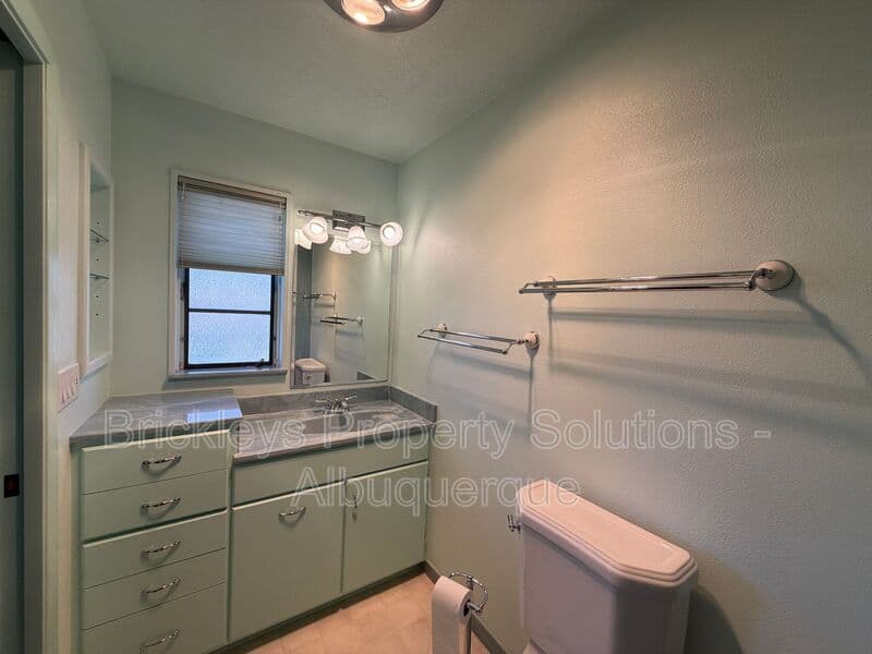 4-bedroom 3-bath home at 7121 Edwina Ave NE for $2,450/mo managed by Brickleys Property Solutions Albuquerque — photo 29 of 47